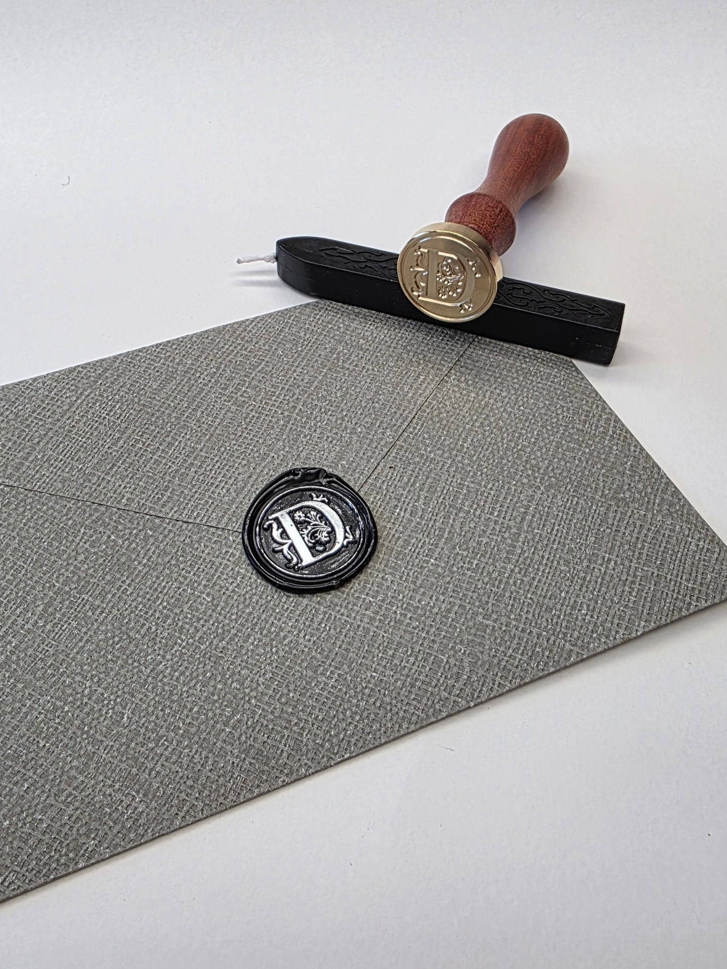 Letter D stamp head