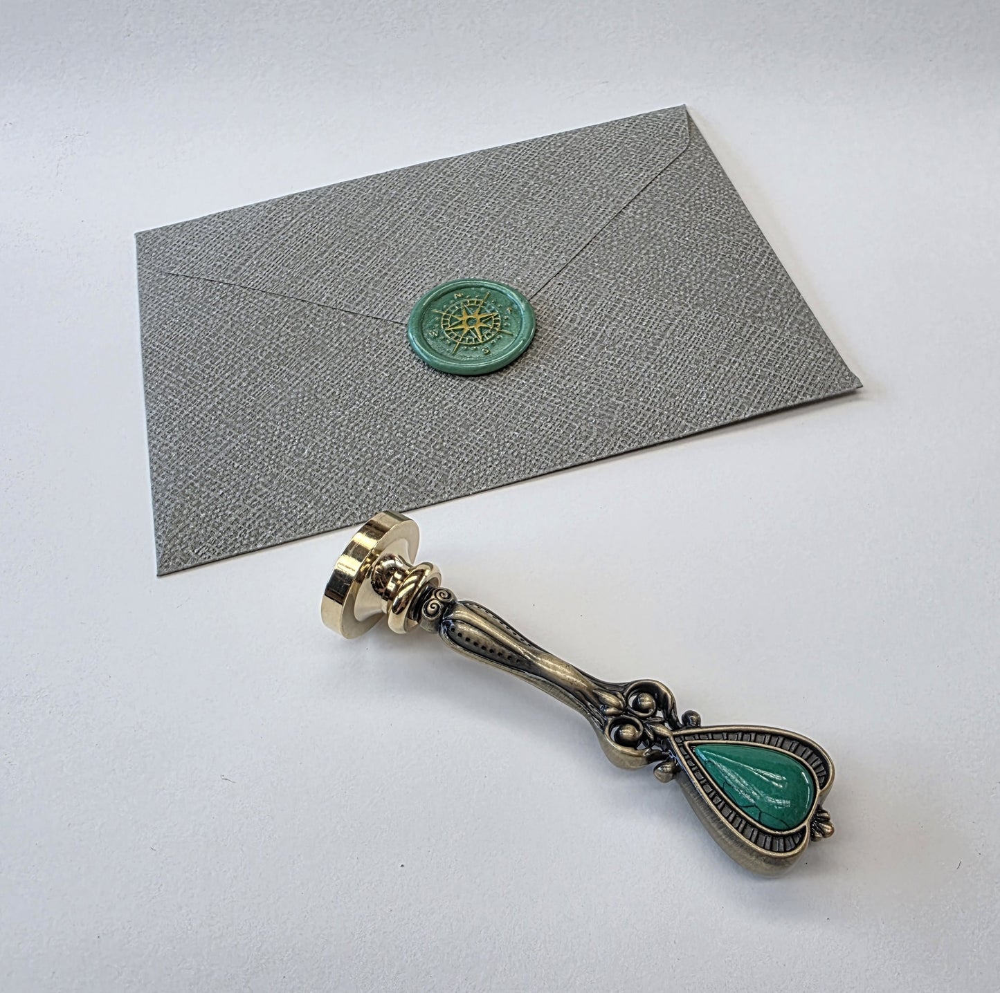 Antique bronze and green handle
