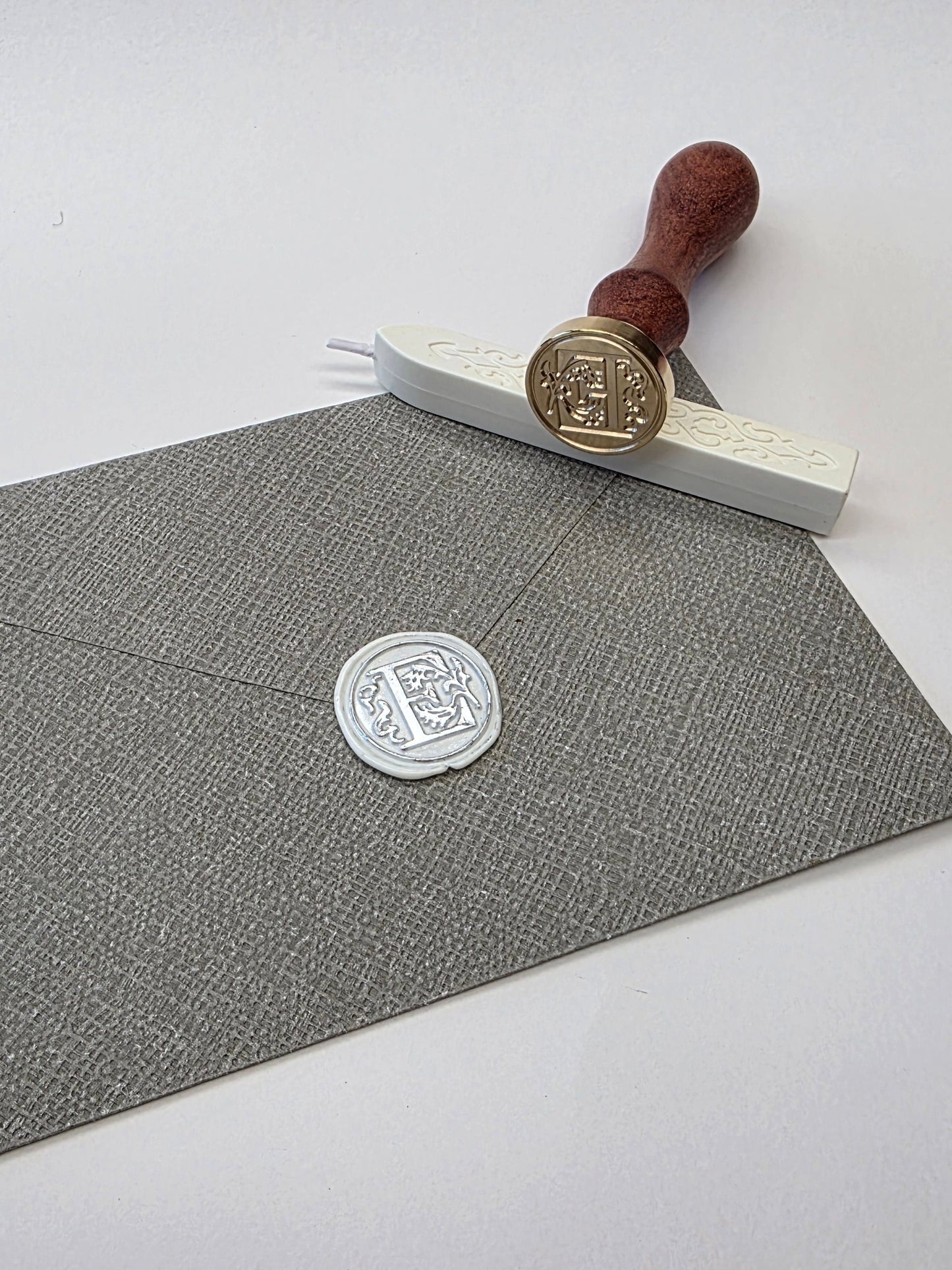 Letter E stamp head