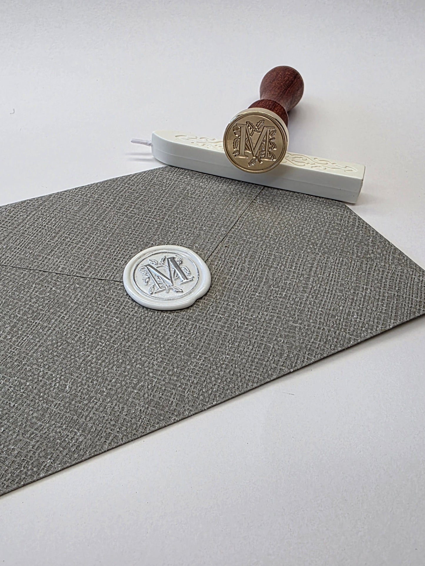 Letter M stamp head