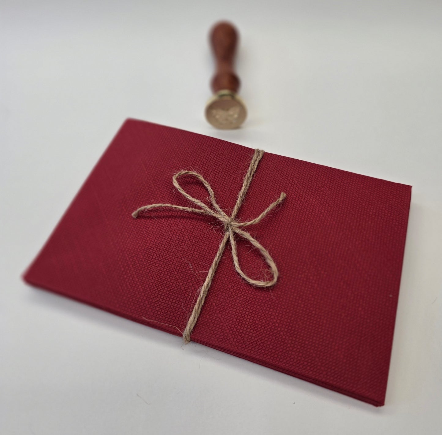 Red linen envelopes
