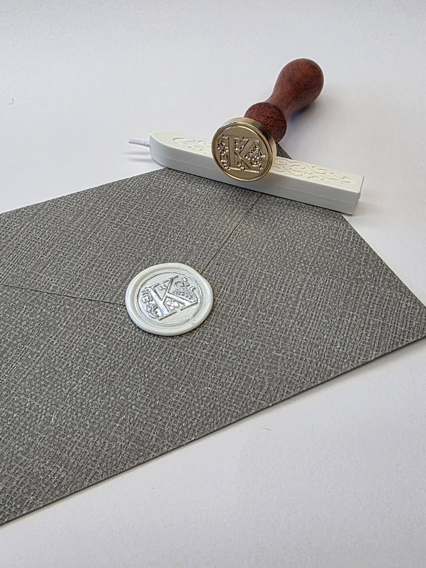 Letter K stamp head