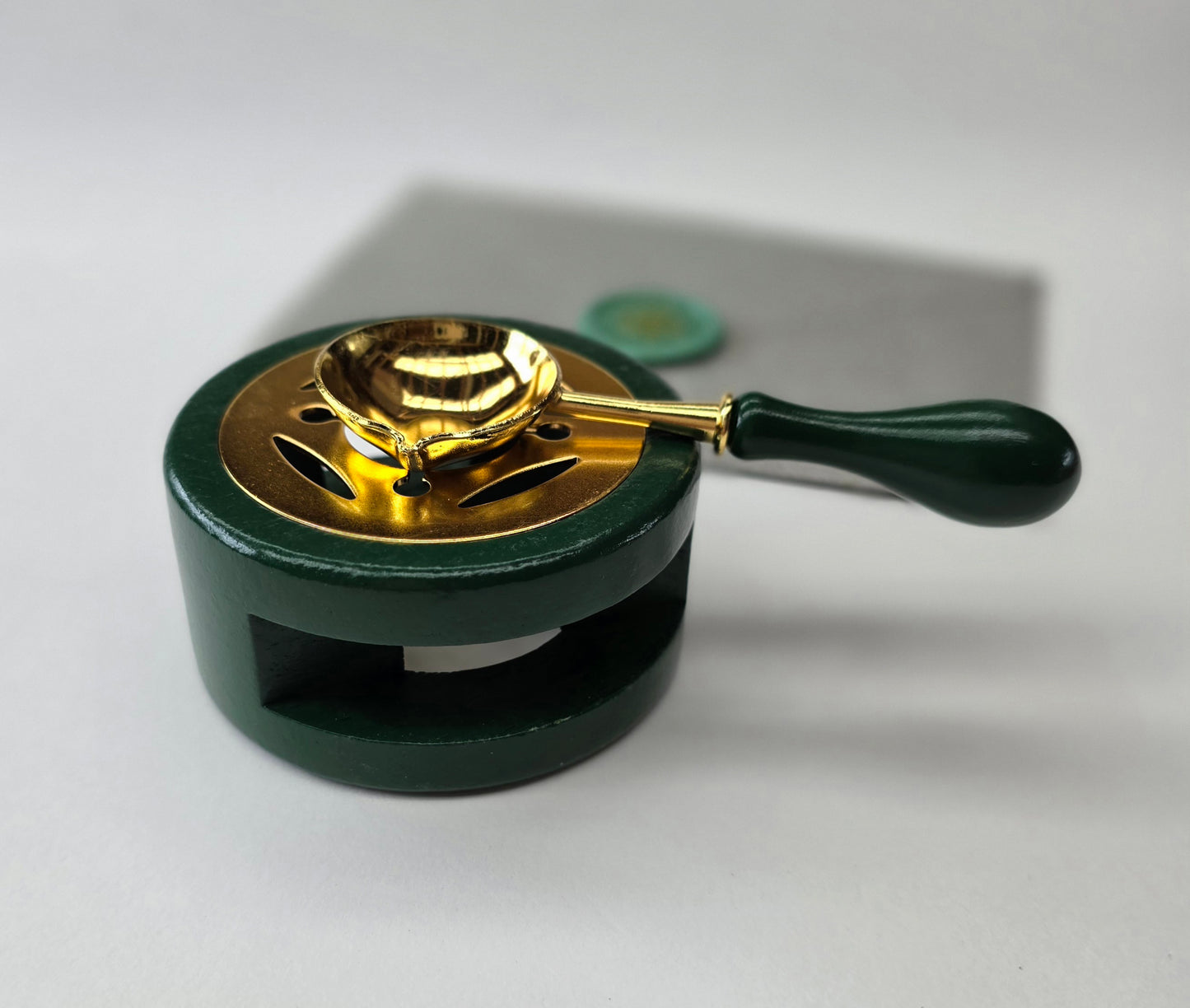 Green sealing wax warmer and spoon