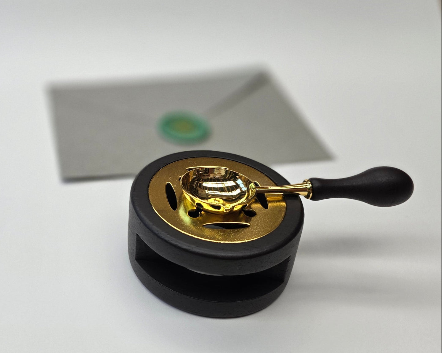Matte black sealing wax warmer and spoon