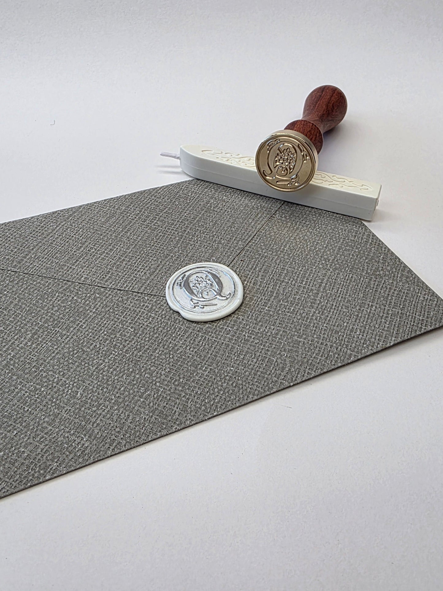 Letter Q stamp head