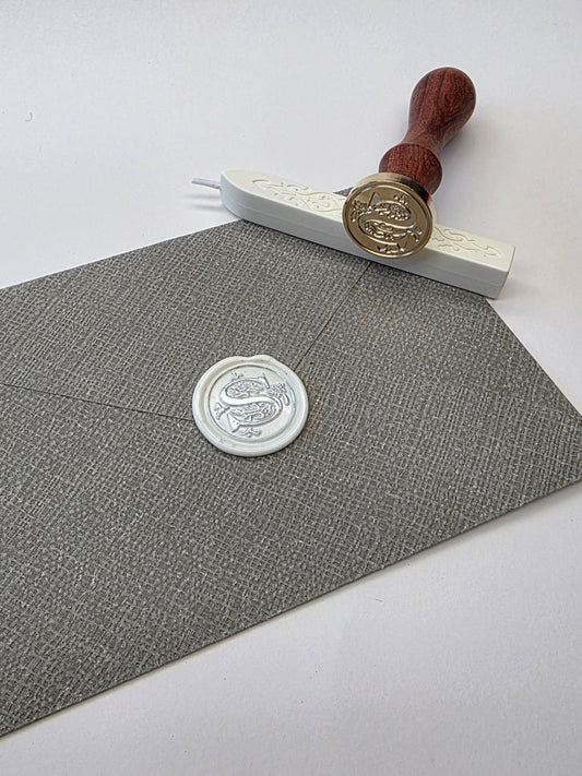 Letter S stamp head
